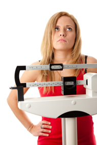woman-standing-on-the-scale-frustrated1
